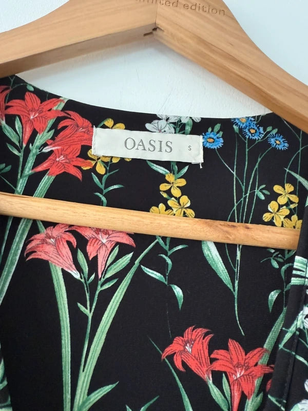 Oasis Floral Wrap Peplum Style Top, photo 4 of 5