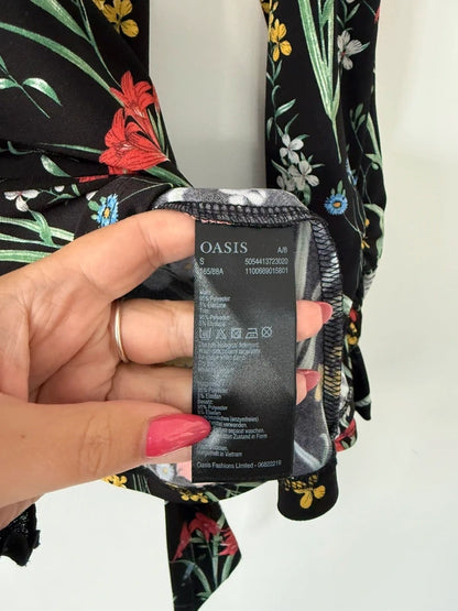 Oasis Floral Wrap Peplum Style Top, photo 5 of 5