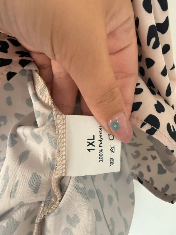 Beige and black printed top, photo 3 of 3